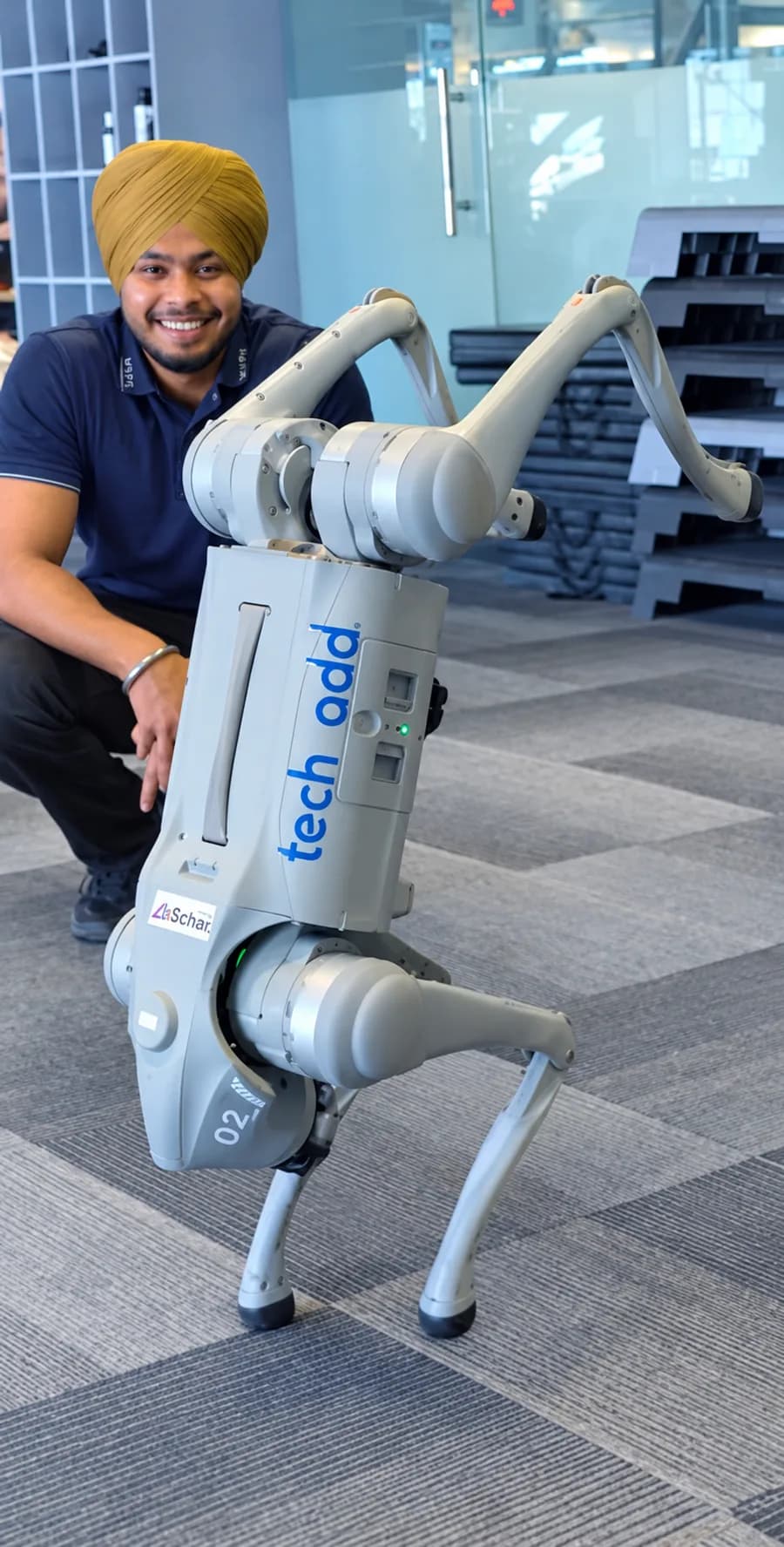 A techcadd trainer with a quadruped robot in the lab
