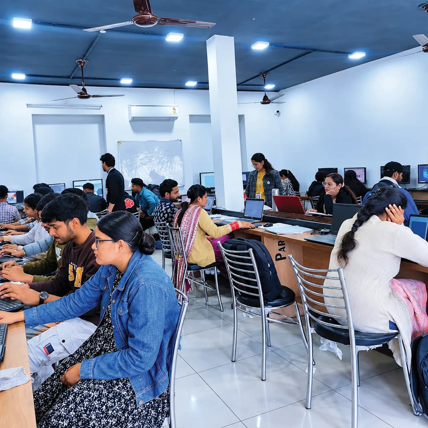 Students and trainers in a full practical lab session