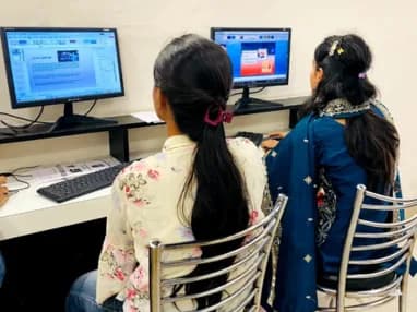 Students working through the Web Development track in the techcadd Phagwara lab