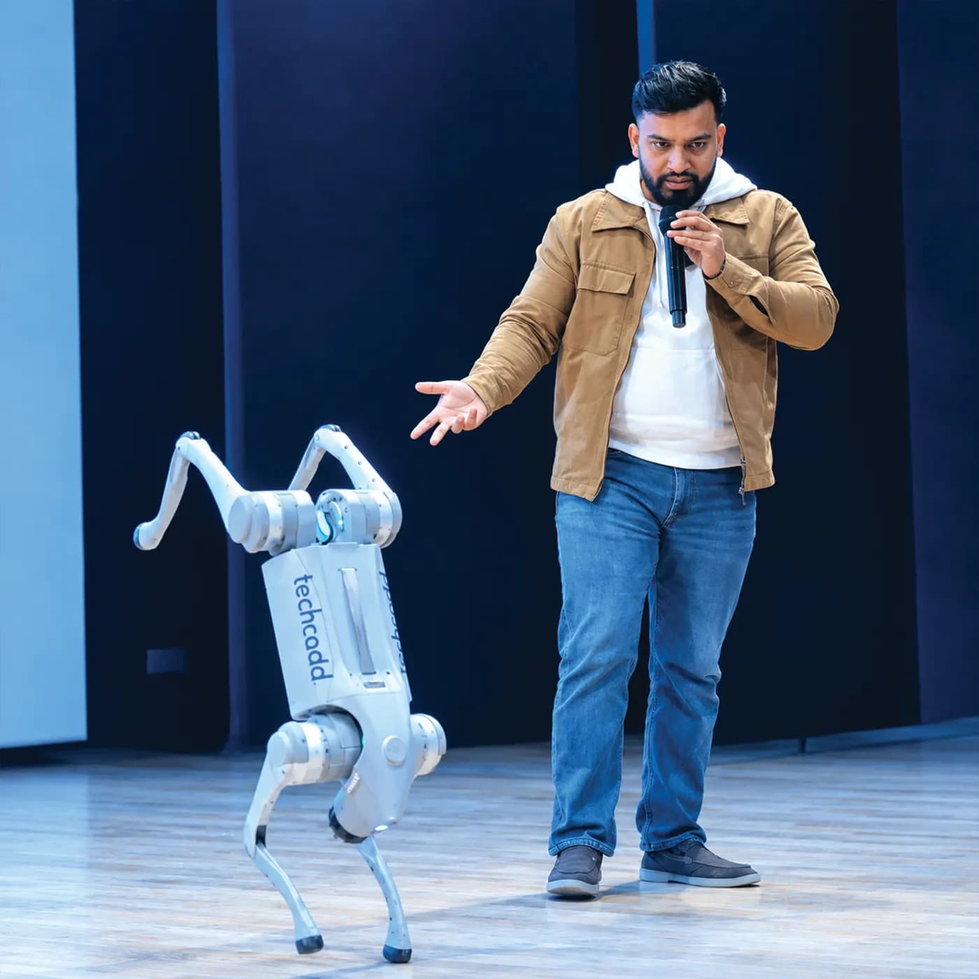 A live robot dog demonstration on stage